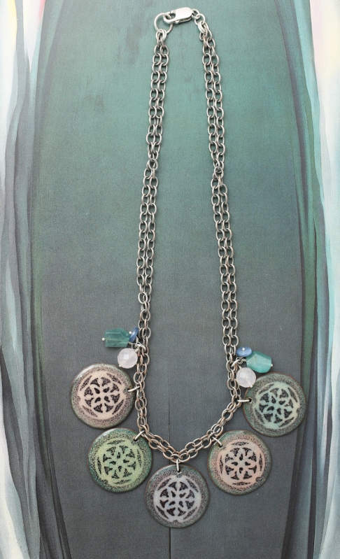 Shield Necklace by Catherine DeYoung | Large hammered copper 32 mm disks, transparent color on one side and translucent white enamel with b Shield Necklace