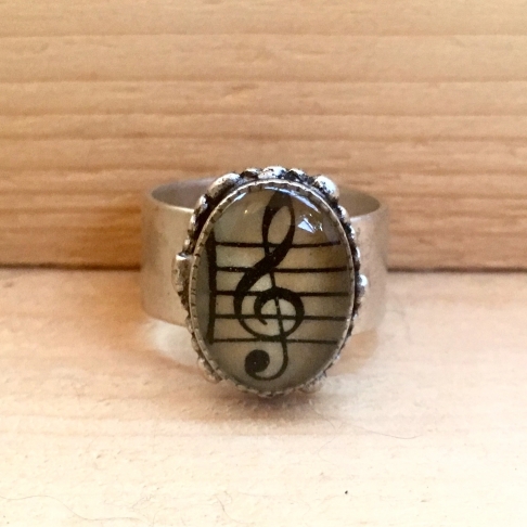Treble Clef Ring by Emily McDonald | Silver plated copper, epoxy resin, sheet music Treble Clef Ring