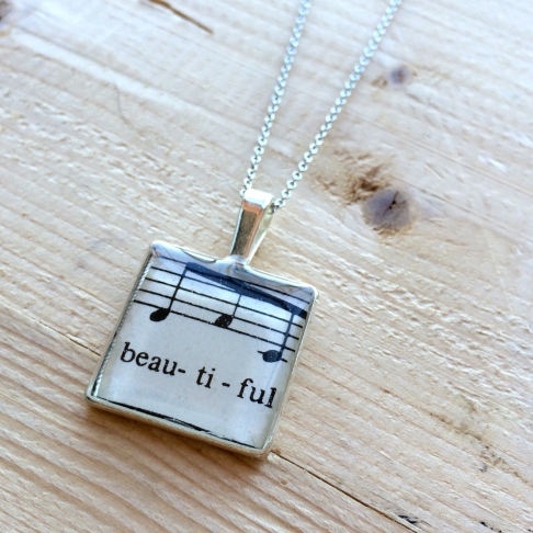 Beautiful Music Pendant Necklace by Emily McDonald | Silver plated copper, epoxy resin, vintage sheet music, stainless steel chain Beautiful Music Pendant Necklace