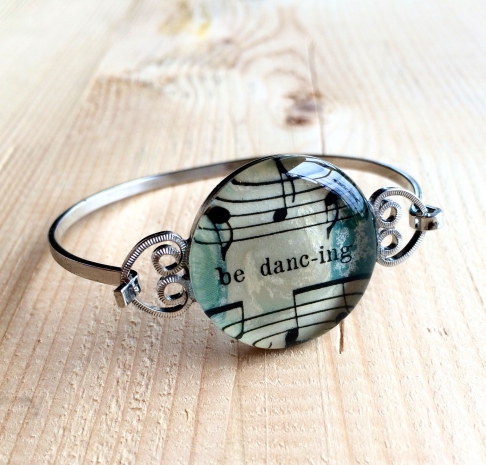 Be Dancing Sheet Music Bracelet by Emily McDonald | epoxy resin, sheet music, silver plated copper Be Dancing Sheet Music Bracelet