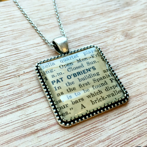 Pat O'Brien's Pendant Necklace by Emily McDonald | <p>Silver plated copper, epoxy resin, vintage map, stainless steel chain</p> Pat O'Brien's Pendant Necklace