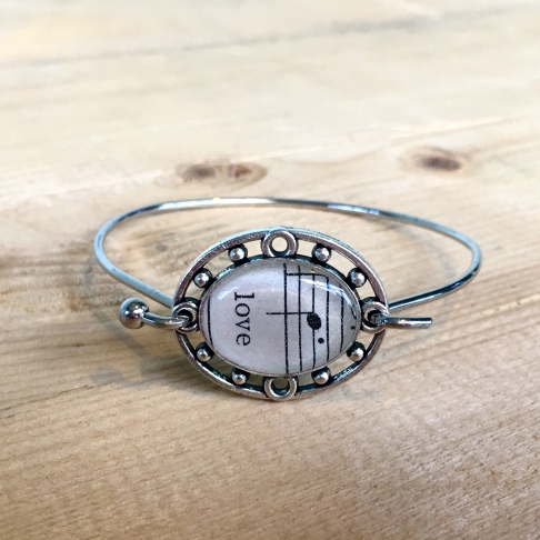 Sheet Music Love Bracelet by Emily McDonald | Silver plated copper, vintage sheet music, epoxy resin Sheet Music Love Bracelet