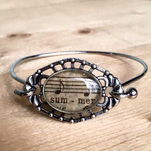 Summer Sheet Music Bracelet by Emily McDonald | Silver plated copper, vintage sheet music, epoxy resin Summer Sheet Music Bracelet