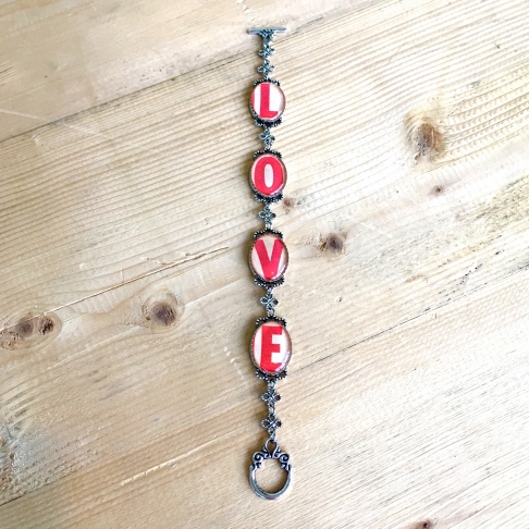 LOVE Link Bracelet by Emily McDonald | Silver plated copper, vintage sheet music, epoxy resin LOVE Link Bracelet