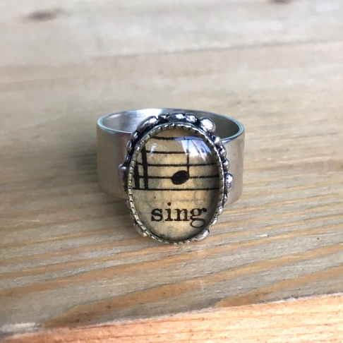 Sing Sheet Music Ring by Emily McDonald | Silver plated copper, epoxy resin, sheet music Sing Sheet Music Ring