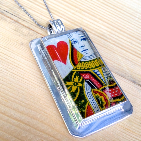 Queen of Hearts Playing Card Necklace by Emily McDonald | Silver plated copper, epoxy resin, playing card, stainless steel chain Queen of Hearts Playing Card Necklace