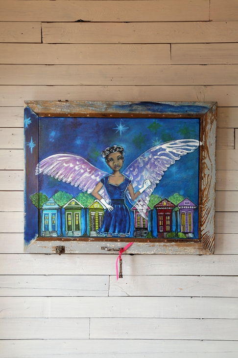 Shotgun Angel by Nancy Wolfe Kimberly | The original is acrylic paint, ink, alcohol, cellophane on canvas, with reclaimed wood frame.
The Shotgun Angel